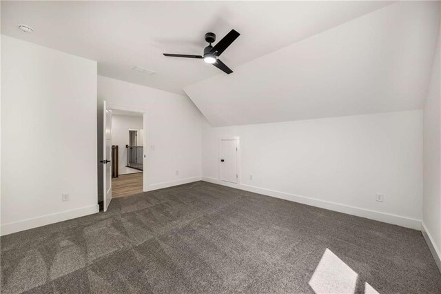 7262 Creekside Way, Jefferson, GA 30549 - bonus room with vaulted ceiling, dark carpet, and ceiling fan