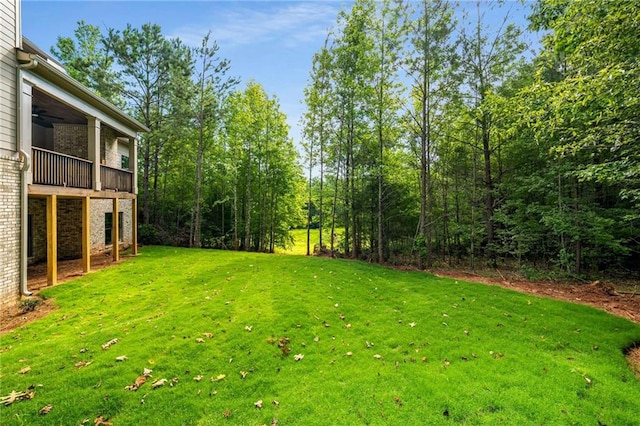 7262 Creekside Way, Jefferson, GA 30549 - view of green lawn with a balcony and a ceiling fan