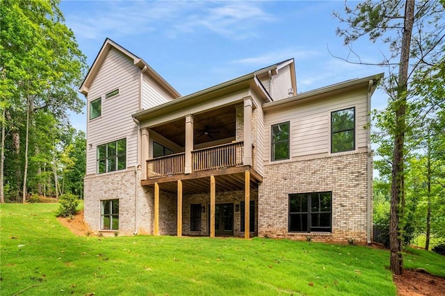 7262 Creekside Way, Jefferson, GA 30549 - rear view of property featuring ceiling fan, a lawn, and brick siding