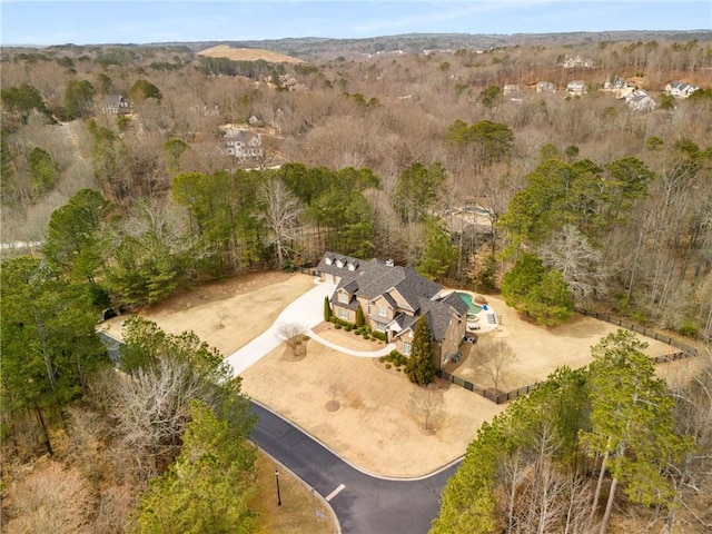 bird's eye view with a forest view