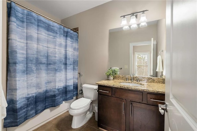 full bathroom with shower / tub combo, vanity, toilet, and tile patterned floors