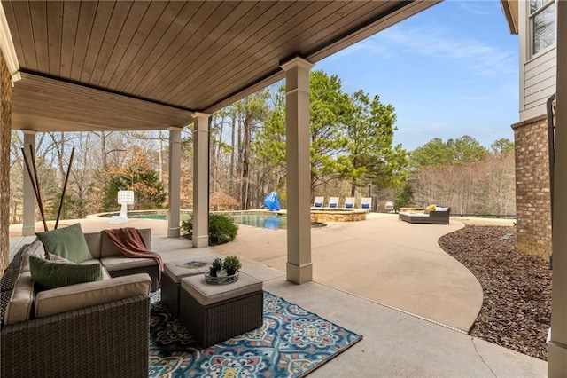 view of patio / terrace featuring an outdoor pool and an outdoor hangout area