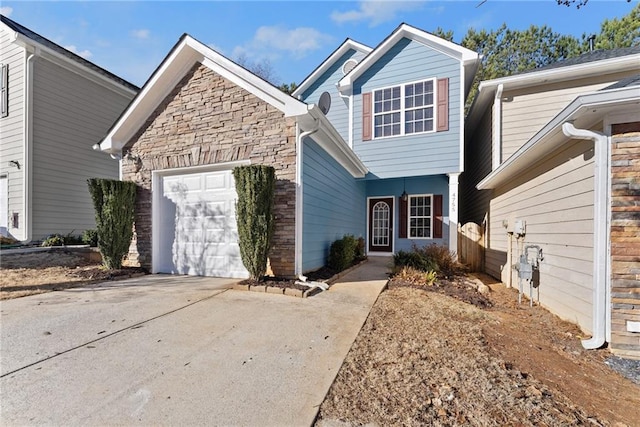 view of front of property with a garage