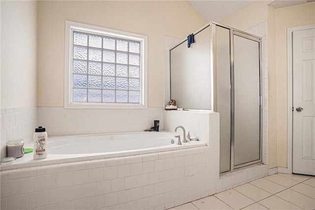 1135 Misty Meadows Way, Hampton, GA 30229 - bathroom with tile patterned flooring, a shower stall, and a garden tub