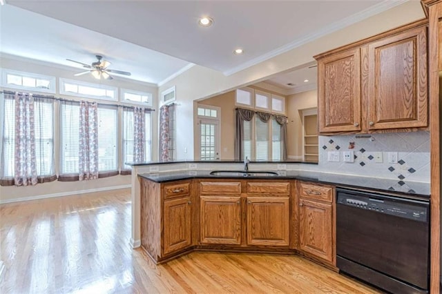 5170 Stone Croft Trl, Atlanta, GA 30331 - kitchen with dishwasher, sink, crown molding, decorative backsplash, and light wood-type flooring