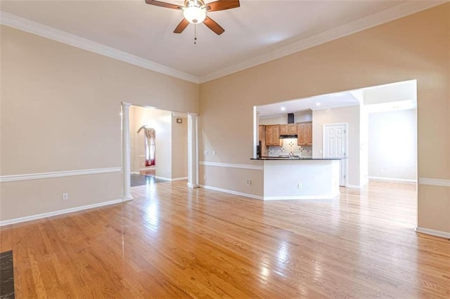 5170 Stone Croft Trl, Atlanta, GA 30331 - unfurnished living room with ceiling fan, light wood-type flooring, and crown molding