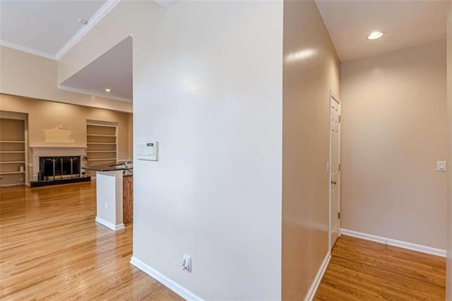 5170 Stone Croft Trl, Atlanta, GA 30331 - hall featuring built in shelves, light hardwood / wood-style floors, and crown molding