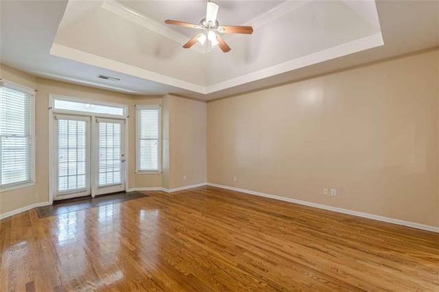 5170 Stone Croft Trl, Atlanta, GA 30331 - empty room featuring ceiling fan, wood-type flooring, and a tray ceiling