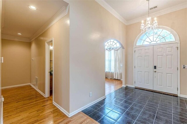 5170 Stone Croft Trl, Atlanta, GA 30331 - entryway with crown molding and a notable chandelier