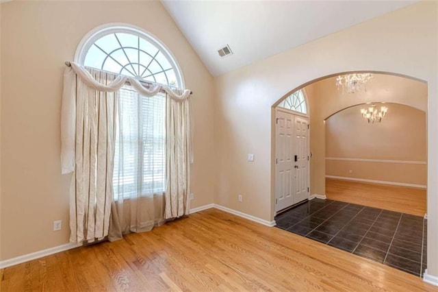 5170 Stone Croft Trl, Atlanta, GA 30331 - entryway with hardwood / wood-style flooring, lofted ceiling, and a chandelier