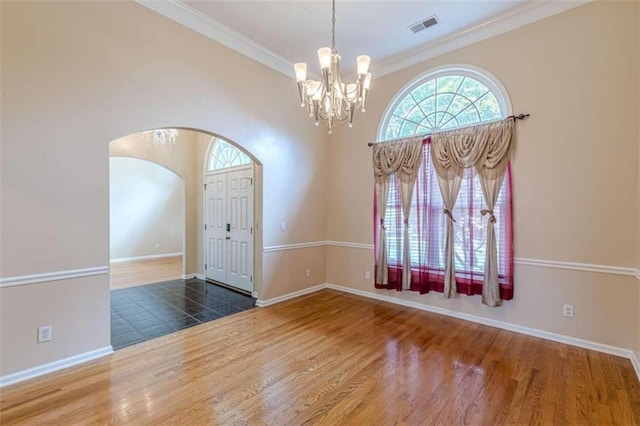 5170 Stone Croft Trl, Atlanta, GA 30331 - foyer featuring a chandelier, dark hardwood / wood-style flooring, and ornamental molding