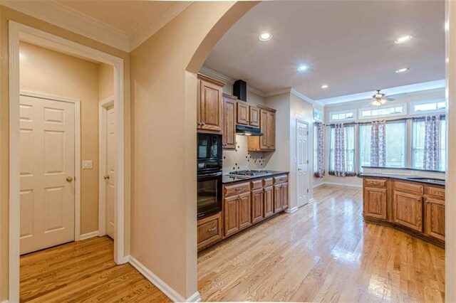 5170 Stone Croft Trl, Atlanta, GA 30331 - kitchen with backsplash, ceiling fan, sink, black appliances, and light hardwood / wood-style flooring
