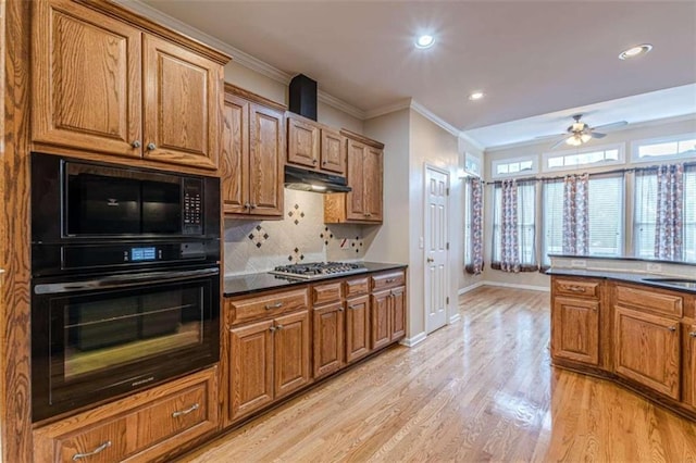 5170 Stone Croft Trl, Atlanta, GA 30331 - kitchen featuring black appliances, ceiling fan, light wood-type flooring, ornamental molding, and tasteful backsplash