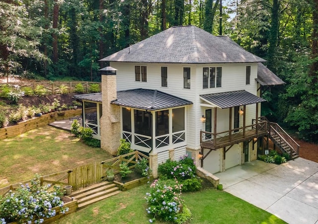 1461 Bubbling Creek Rd NE, Brookhaven, GA 30319 - view of front facade with stairs, a standing seam roof, a shingled roof, metal roof, and driveway