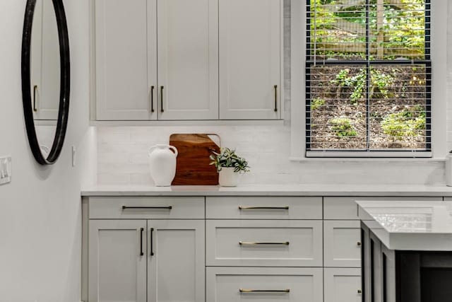 1461 Bubbling Creek Rd NE, Brookhaven, GA 30319 - kitchen with light countertops and tasteful backsplash