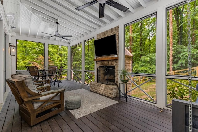 1461 Bubbling Creek Rd NE, Brookhaven, GA 30319 - sunroom / solarium with ceiling fan and a fireplace