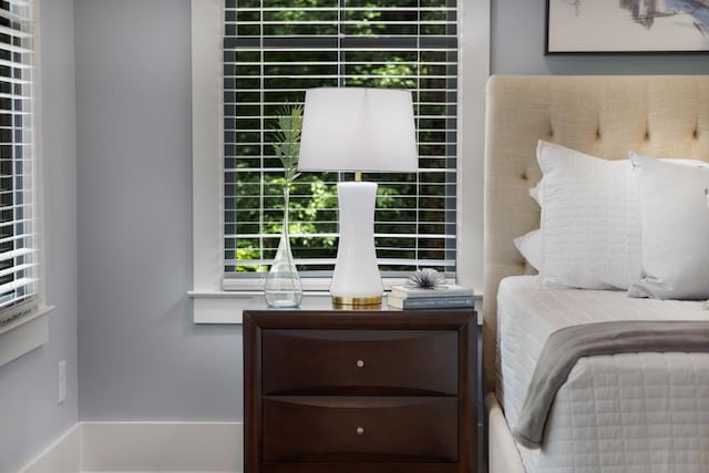 1461 Bubbling Creek Rd NE, Brookhaven, GA 30319 - bedroom featuring multiple windows