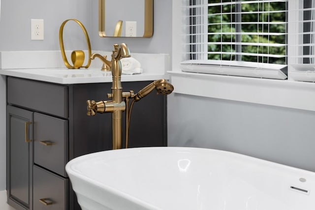 1461 Bubbling Creek Rd NE, Brookhaven, GA 30319 - bathroom featuring a freestanding tub and vanity