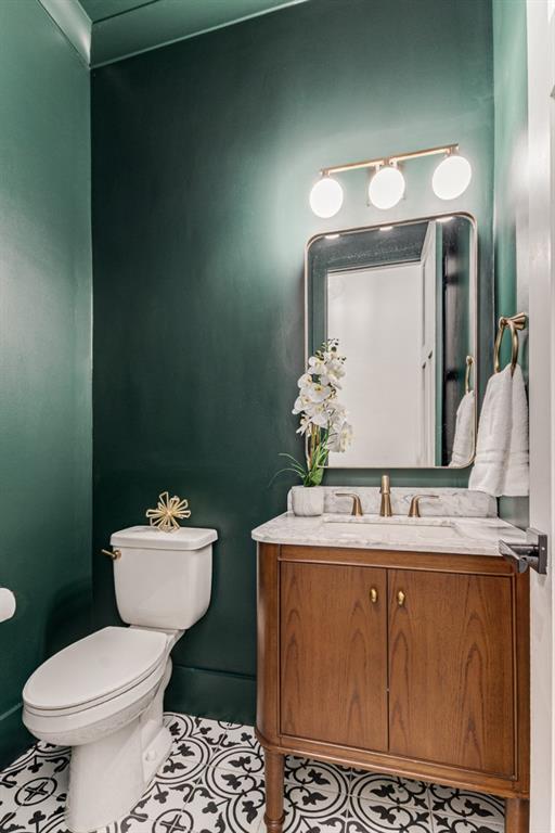 1461 Bubbling Creek Rd NE, Brookhaven, GA 30319 - bathroom featuring toilet, tile patterned floors, and vanity