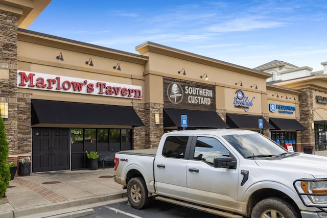 1461 Bubbling Creek Rd NE, Brookhaven, GA 30319 - view of commercial property featuring uncovered parking