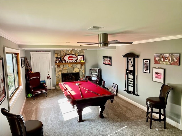 2694 Tritt Springs Dr NE, Marietta, GA 30062 - playroom featuring a ceiling fan, crown molding, carpet floors, a stone fireplace, and baseboards