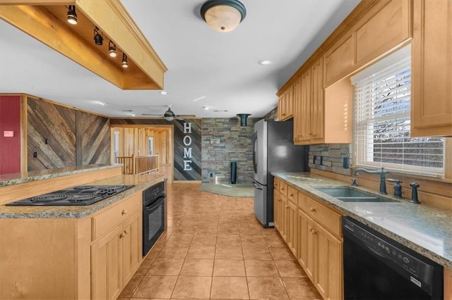 kitchen featuring ceiling fan, decorative backsplash, light tile patterned flooring, black appliances, and a sink