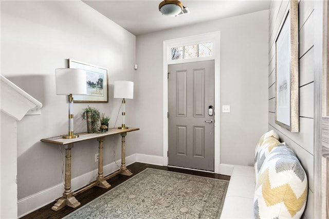 entrance foyer with dark hardwood / wood-style flooring