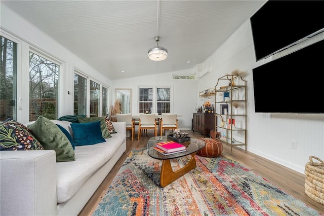 sunroom with lofted ceiling