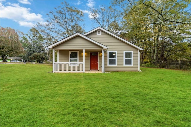 bungalow-style house featuring a porch and a front lawn