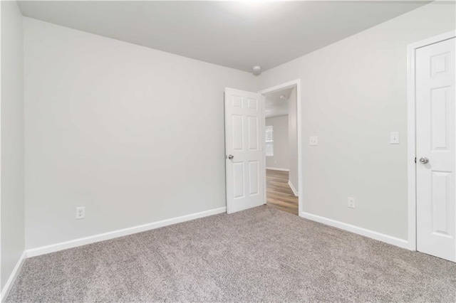 unfurnished bedroom with carpet flooring