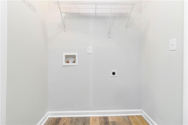 laundry room with hookup for an electric dryer, wood-type flooring, and hookup for a washing machine