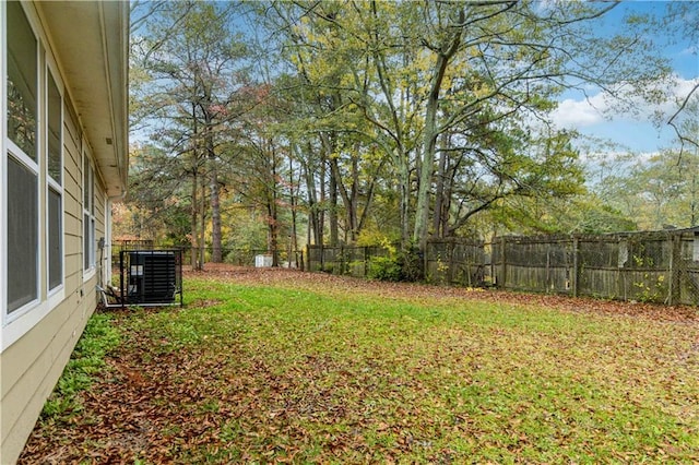 view of yard with central AC unit