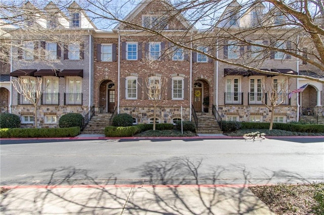 multi unit property featuring brick siding