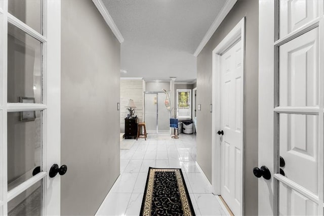 corridor with crown molding and french doors