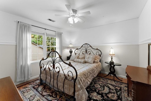 bedroom featuring ceiling fan and hardwood / wood-style floors