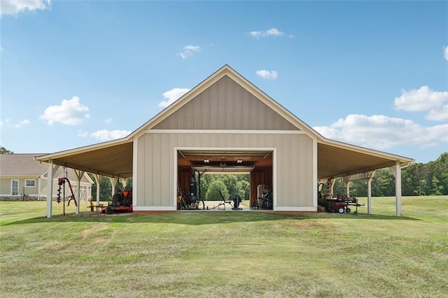 view of community with an outbuilding and a lawn