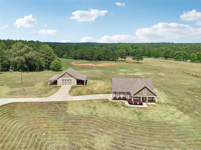 birds eye view of property featuring a rural view