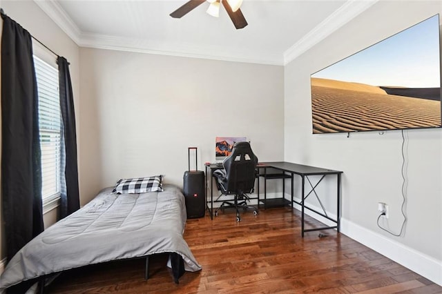 bedroom with multiple windows, dark hardwood / wood-style floors, ceiling fan, and ornamental molding