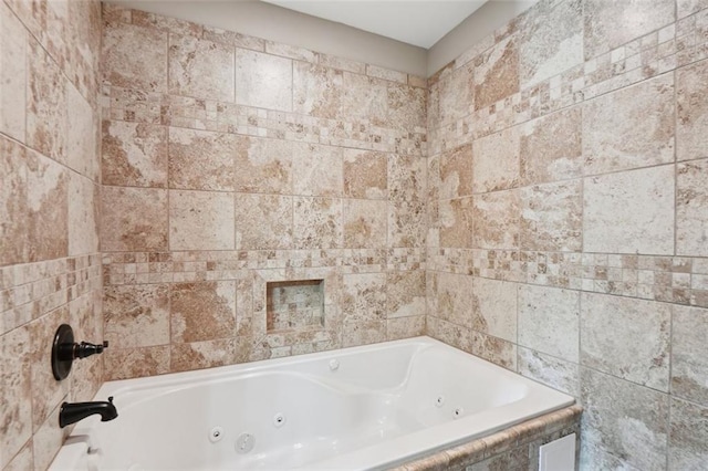 bathroom featuring tiled bath