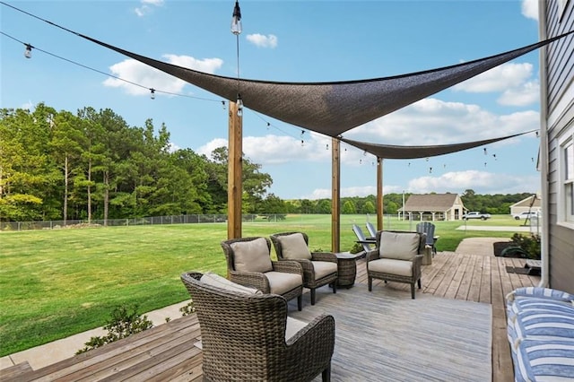 wooden deck with outdoor lounge area and a yard