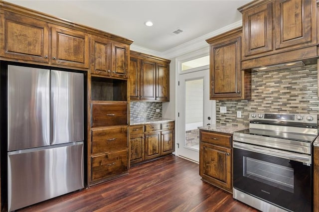 kitchen with light stone countertops, appliances with stainless steel finishes, tasteful backsplash, ornamental molding, and dark hardwood / wood-style flooring