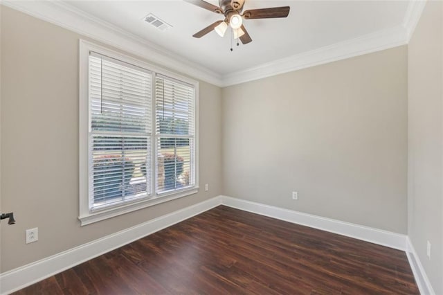 empty room with ceiling fan, dark wood-type flooring, and ornamental molding