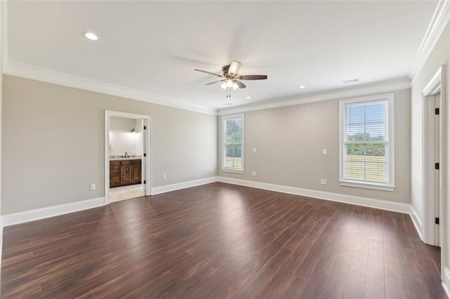 unfurnished room with sink, dark wood-type flooring, ceiling fan, and ornamental molding