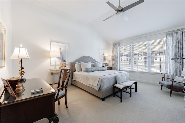 bedroom with a ceiling fan, light carpet, baseboards, and vaulted ceiling