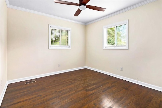 spare room featuring ceiling fan, dark hardwood / wood-style flooring, and ornamental molding