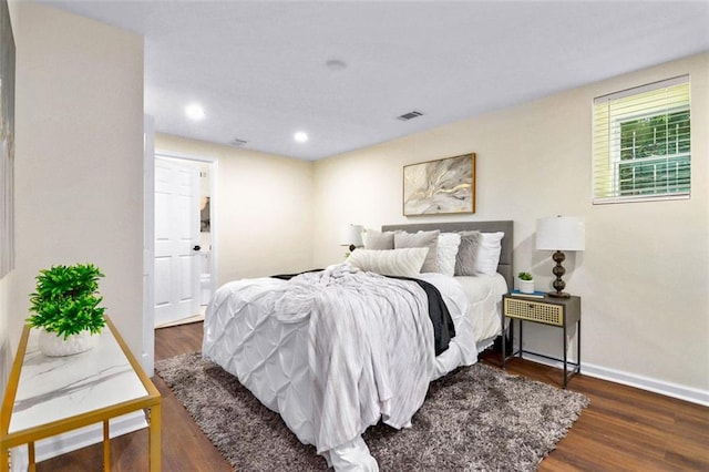 bedroom featuring dark hardwood / wood-style floors