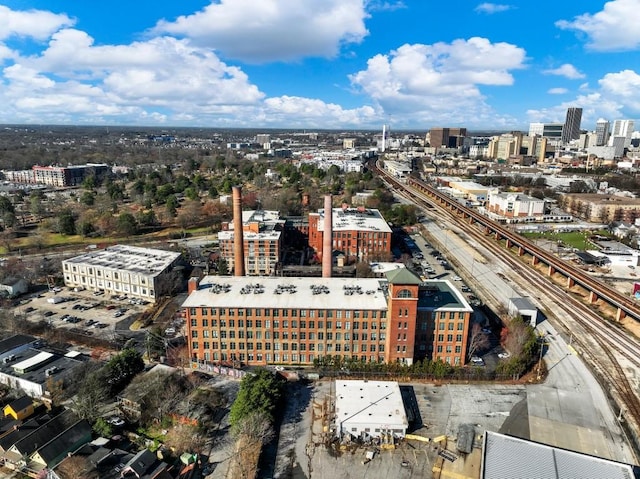 birds eye view of property featuring a city view