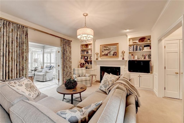 living room featuring a chandelier, light carpet, a fireplace, built in features, and crown molding