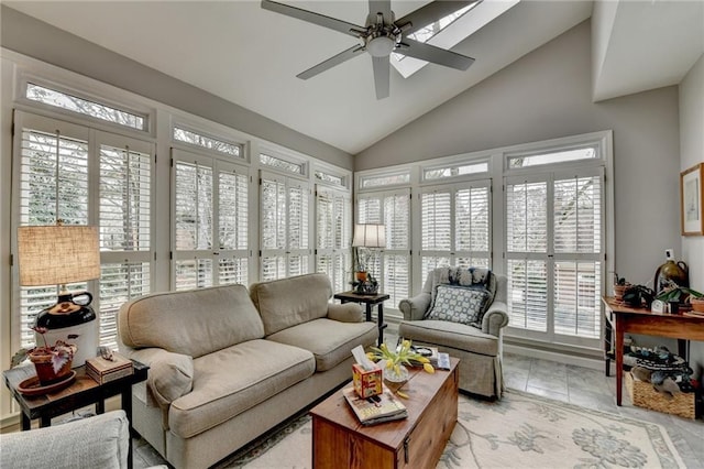 sunroom with lofted ceiling and ceiling fan