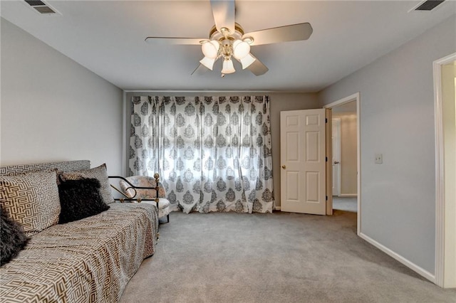 living area with a ceiling fan, carpet, visible vents, and baseboards